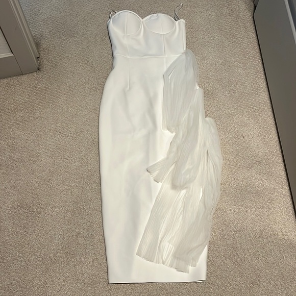 Never worn new with tags. Amazing quality, no blemishes very flattering. - Picture 1 of 3